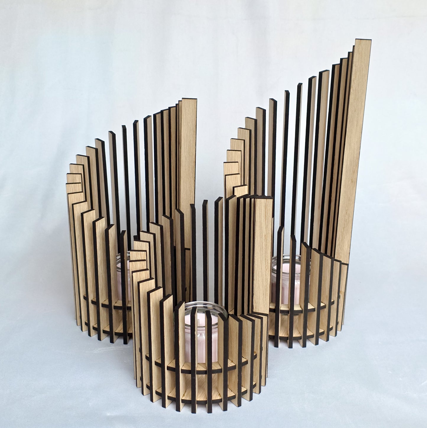 Wooden wall art with vertical slats on a white background